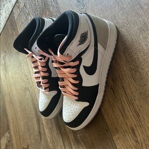 Stylish Women's Jordan Sneakers in Black, great, and white.